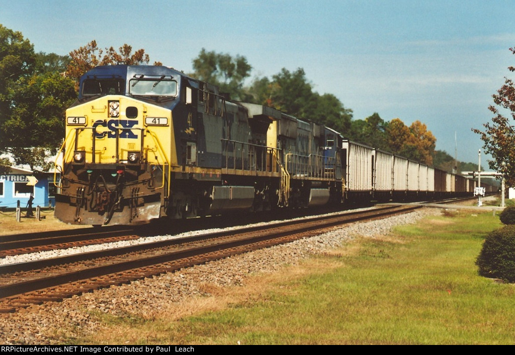 Loaded coal train rolls south